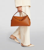 Toteme T-Lock top-handle bag in Italian leather (British brand)
