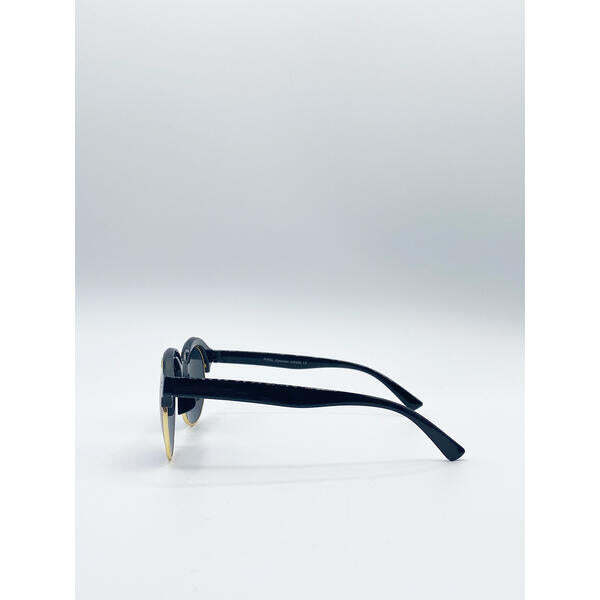 SVNX schwarze runde Sonnenbrille mit blauen Revo-Gläsern und Golddetail, importiert aus dem Vereinigten Königreich