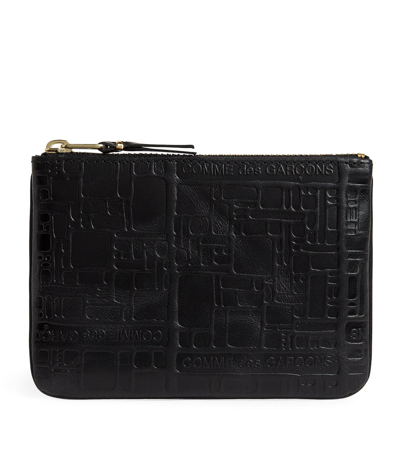 Comme Des Garçons leather embossed zipped pouch - British product