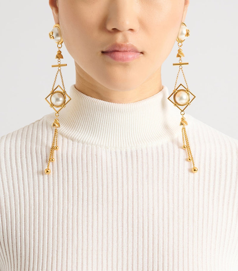 Balmain monogram pendant earrings brass, UK version