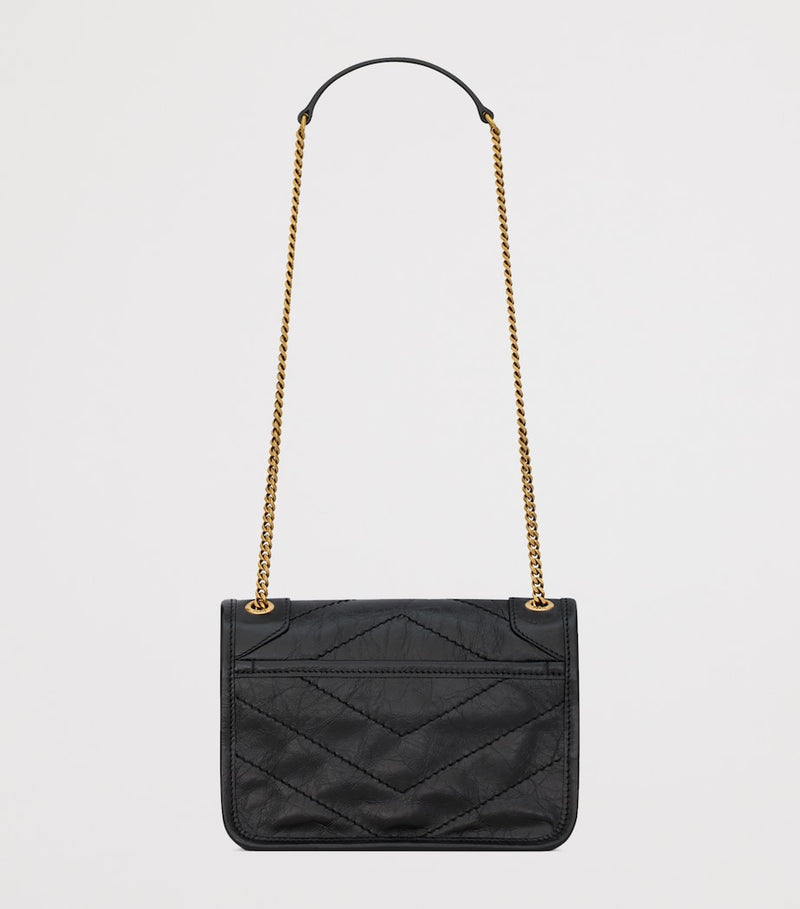 Saint Laurent Mini Niki shoulder bag with YSL monogram, imported from the UK