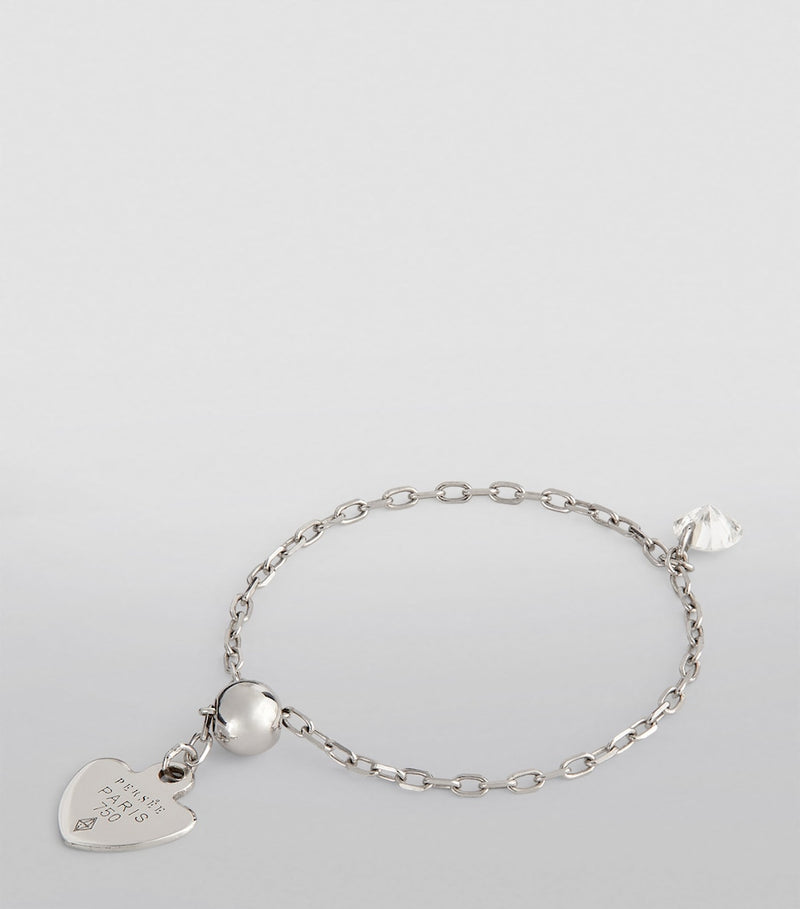 Persée white gold ring with floating diamond, UK version