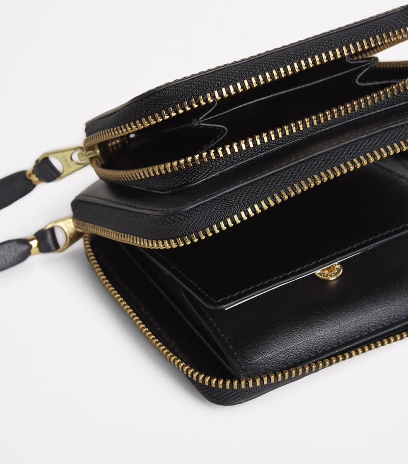 Comme des Garçons zipped leather wallet - British product
