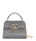 Valentino Garavani mini leather top-handle bag - British product