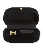 Moleskine gold-plated H notebook charm, imported from the UK