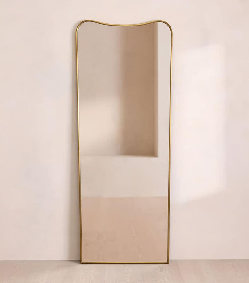 Soho Home Cooper antiqued brass floor mirror, imported from the UK