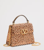 Valentino Garavani VSLING top-handle bag crystal embellishments, UK version