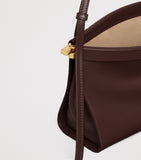 Alaïa medium leather Le Click East West shoulder bag, imported from the UK