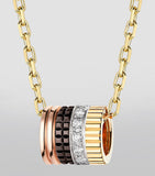 Boucheron Quatre Classique pendant mixed gold and diamonds, imported from the UK