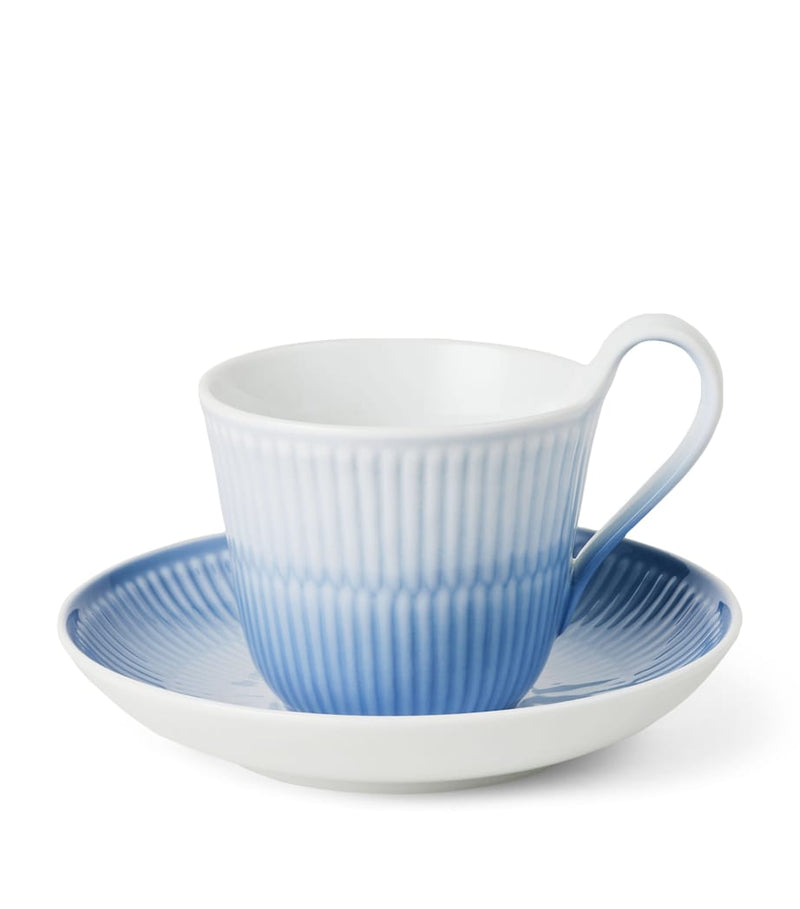 Royal Copenhagen Iris porcelain cup and saucer, H9cm x W15cm, imported from the UK