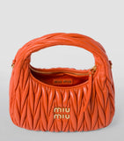 Miu Miu small matelassé leather Wander top-handle bag, UK version