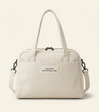 Prada Mini Carry top-handle bag in antiqued leather, imported from the UK