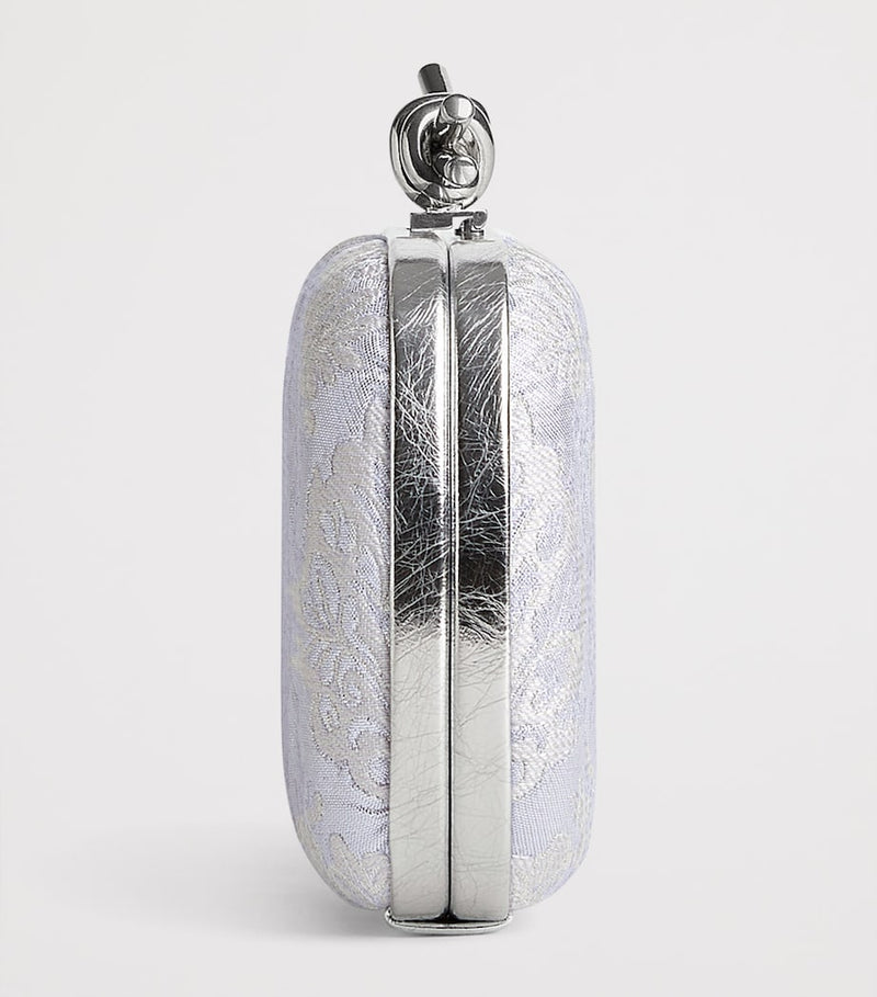 Bottega Veneta Jacquard Knot lurex clutch bag, imported from the UK