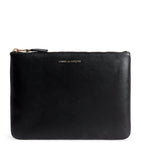 Comme des Garçons large leather zipped pouch - British product