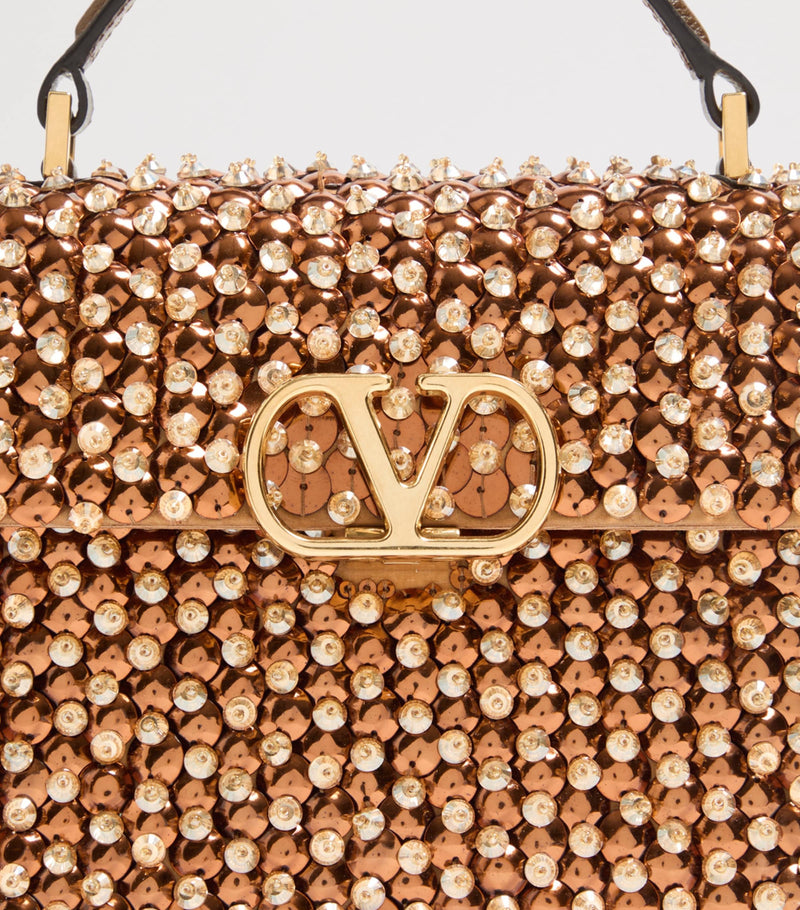 Valentino Garavani VSLING top-handle bag crystal embellishments, UK version
