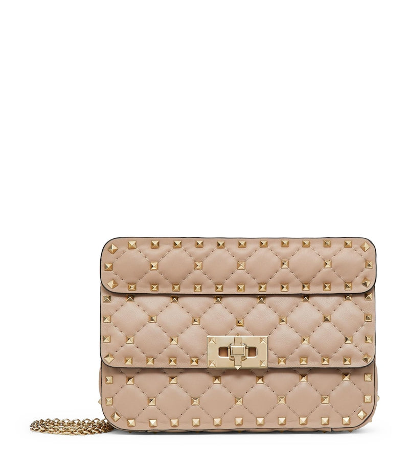 Valentino Garavani Small Rockstud Spike top-handle bag quilted lambskin (British brand)