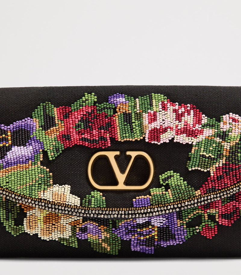 Valentino Garavani small linen embellished DeVain shoulder bag, imported from the UK
