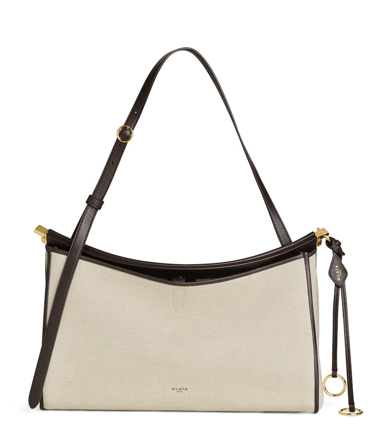 Alaïa Le Click Pocket 35 shoulder bag in calf leather - British product