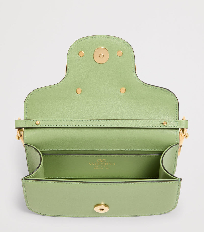 Valentino Garavani Locò small leather shoulder bag, imported from the UK