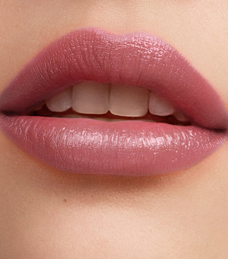 Carolina Herrera mini tinted lip balm with sheer finish (British brand)