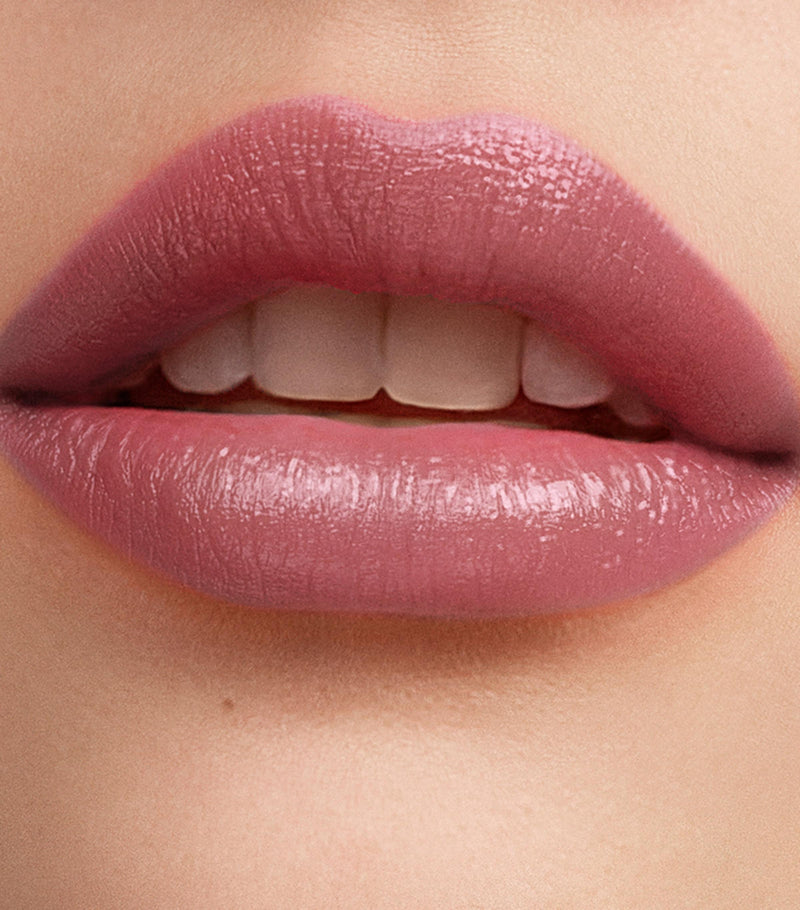 Carolina Herrera mini tinted lip balm with sheer finish (British brand)