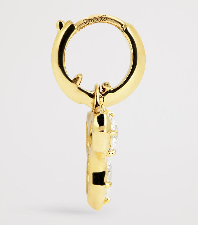Jade Trau Poppy huggie earrings in yellow gold with diamonds, imported from the UK