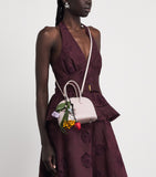 Self-Portrait mini leather top-handle bag, imported from the UK