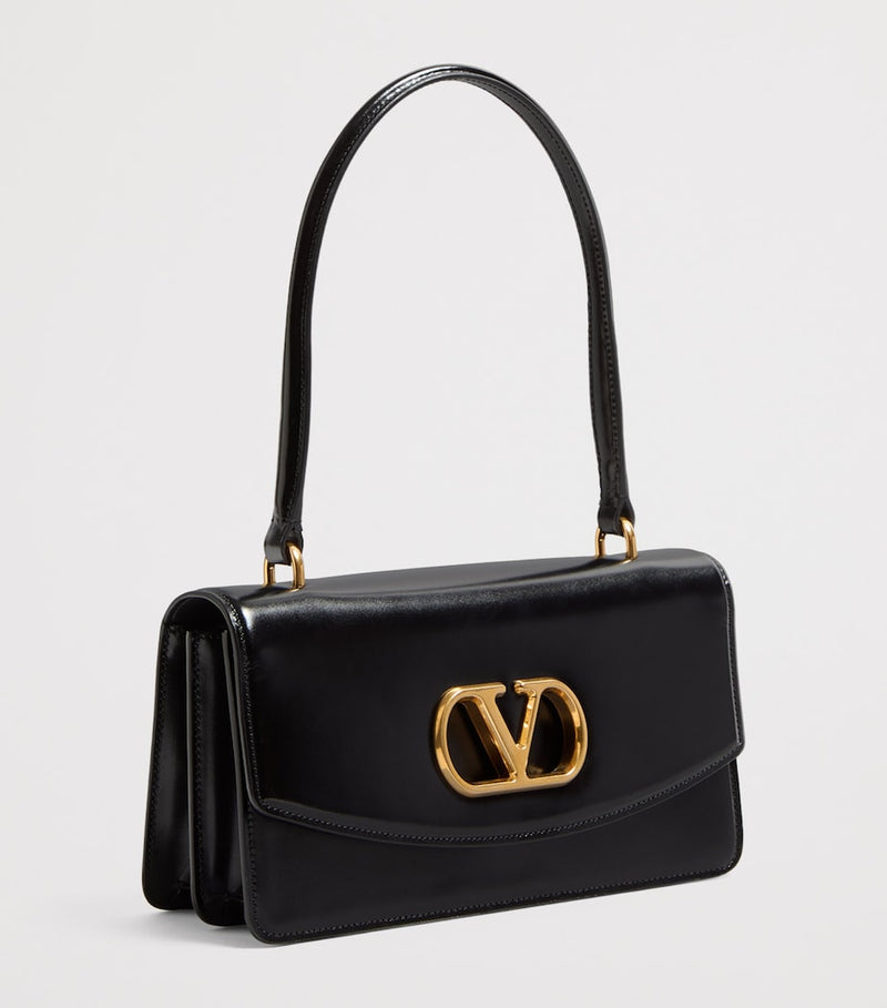 Valentino Garavani Vain top-handle leather bag, imported from the UK