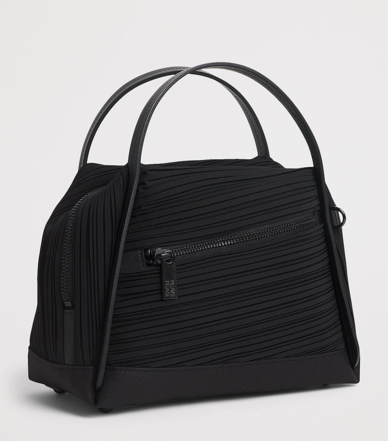 Pleats Please Issey Miyake bias pleats top-handle bag, imported from the UK
