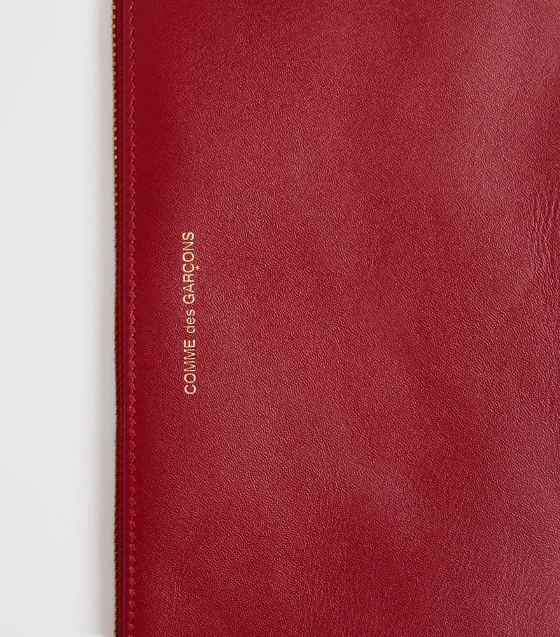 Comme des Garçons large leather zipped pouch - British product