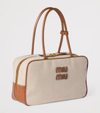 Miu Miu Beau top-handle bag in leather-canvas, UK version