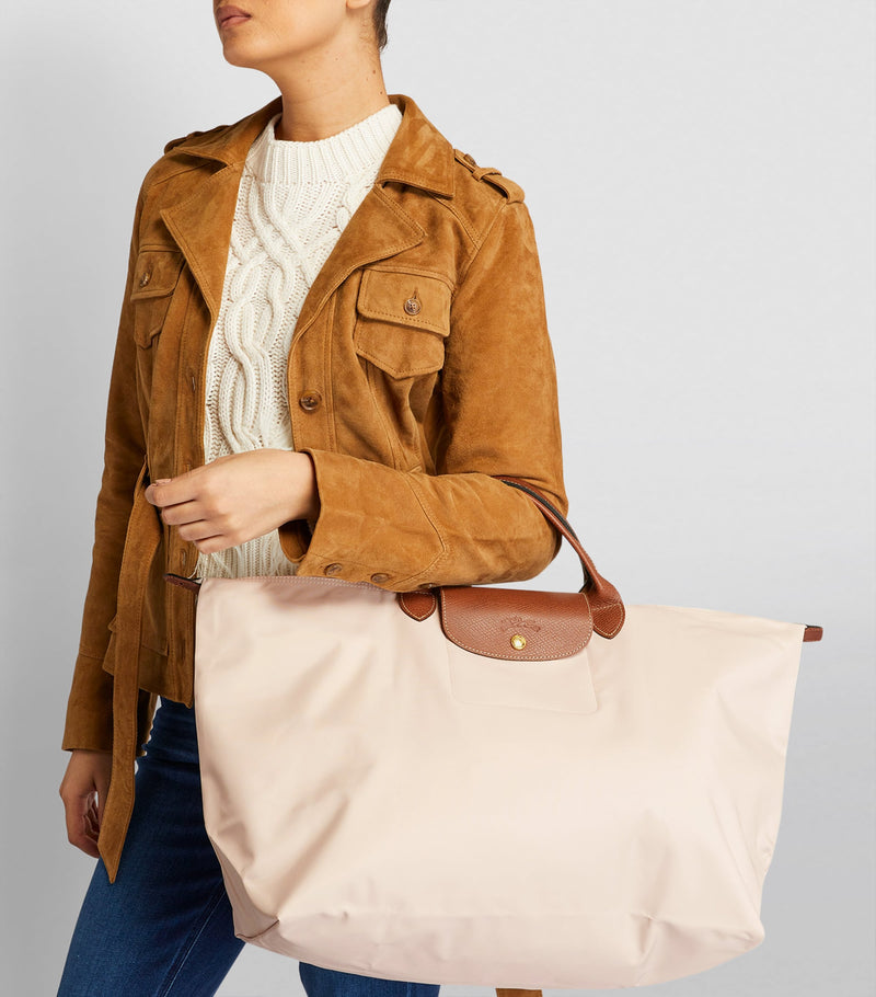 Longchamp small Le Pliage travel bag, imported from the UK