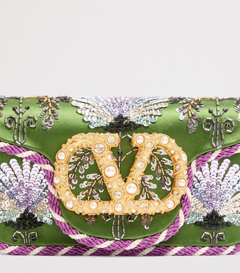 Valentino Garavani small embellished Locò shoulder bag, imported from the UK