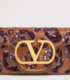 Valentino Garavani small embellished Locò shoulder bag, imported from the UK