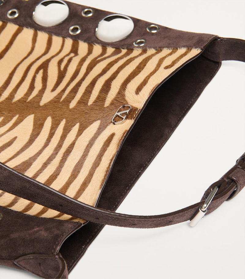 Valentino Garavani Nellcôte cross-body bag zebra print leather, imported from the UK