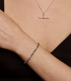 Astrid & Miyu rhodium-plated pavé chain link bracelet, UK version