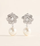 Self-Portrait mini flower embellished earrings, imported from the UK