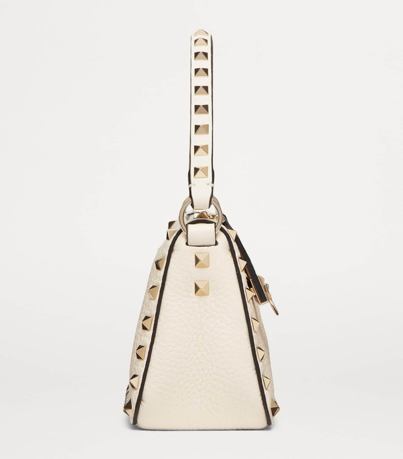 Valentino Garavani small leather Rockstud shoulder bag (British brand)