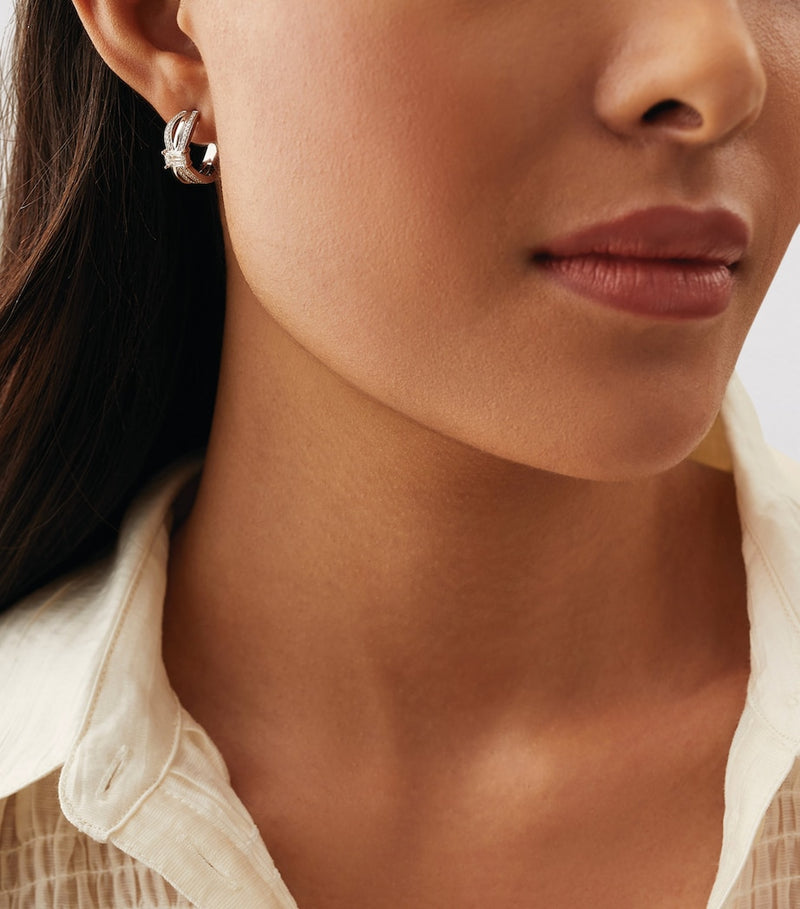 Boodles platinum and diamond Ribbons earrings, imported from the UK