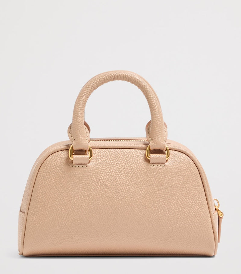 Valentino Garavani mini grained leather VLogo Signature bag, imported from the UK