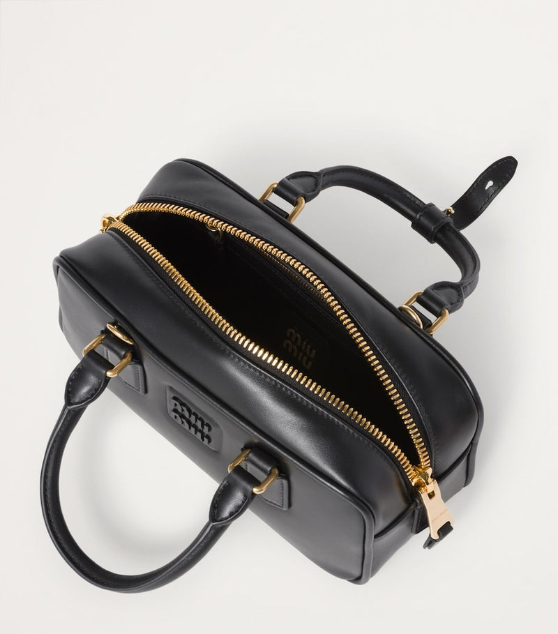 Miu Miu Arcadie top-handle bag in leather, imported from the UK