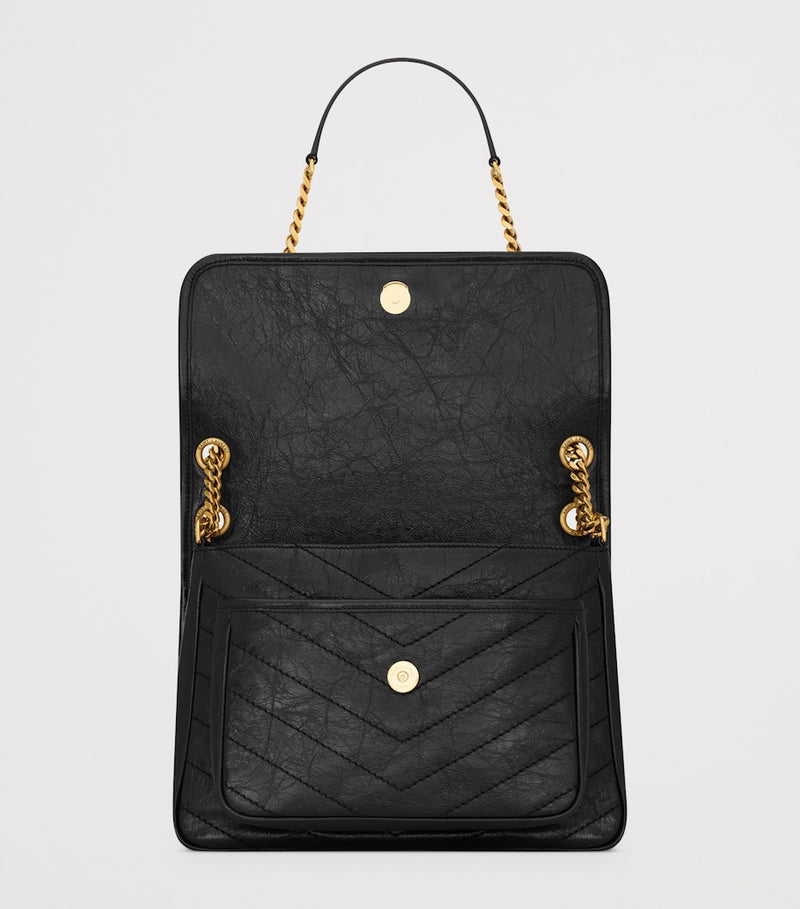 Saint Laurent Niki medium shoulder bag in textured calfskin (British brand)