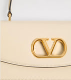 Valentino Garavani Vain top-handle leather bag, imported from the UK