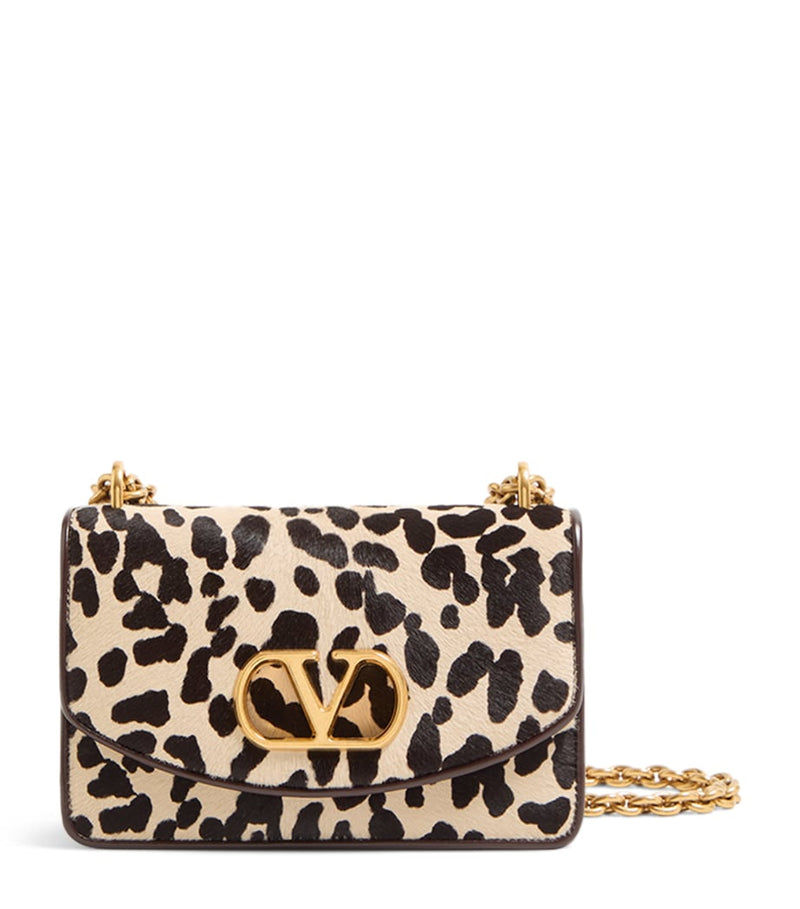 Valentino Garavani Vain small leather shoulder bag, imported from the UK