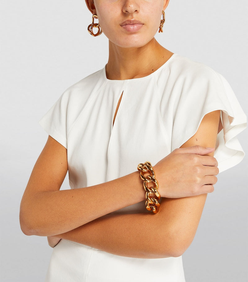 Isabel Marant multi-hoop earrings in polished brass, imported from the UK