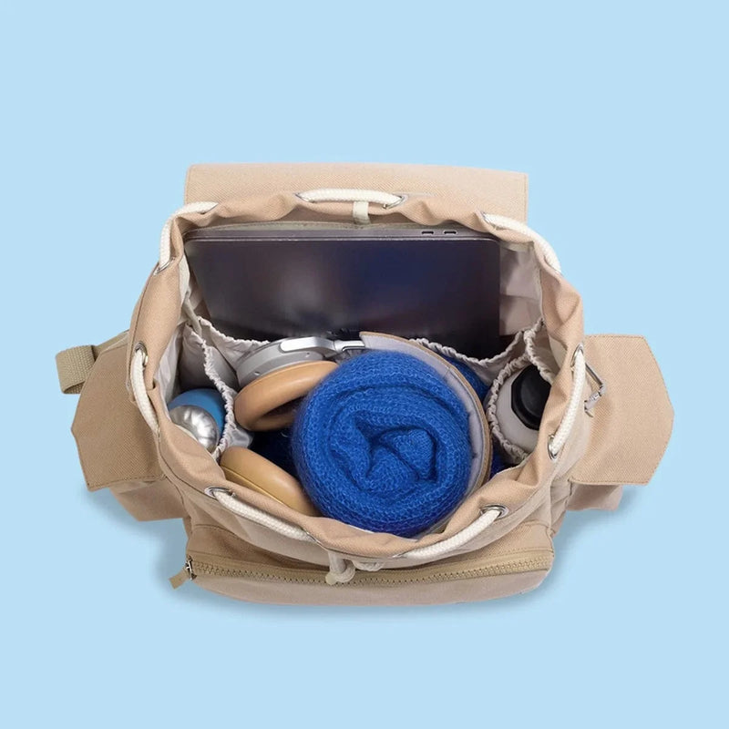 KAOS Ransel changing bag backpack in beige (British brand)