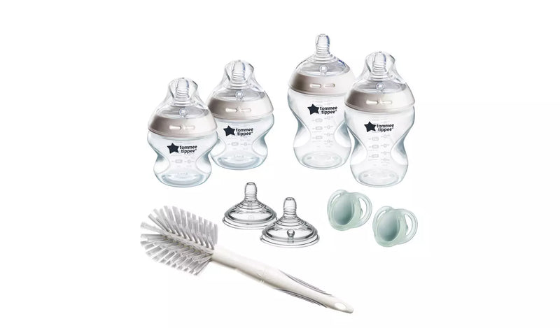 Tommee Tippee white baby bottle starter kit, imported from the UK