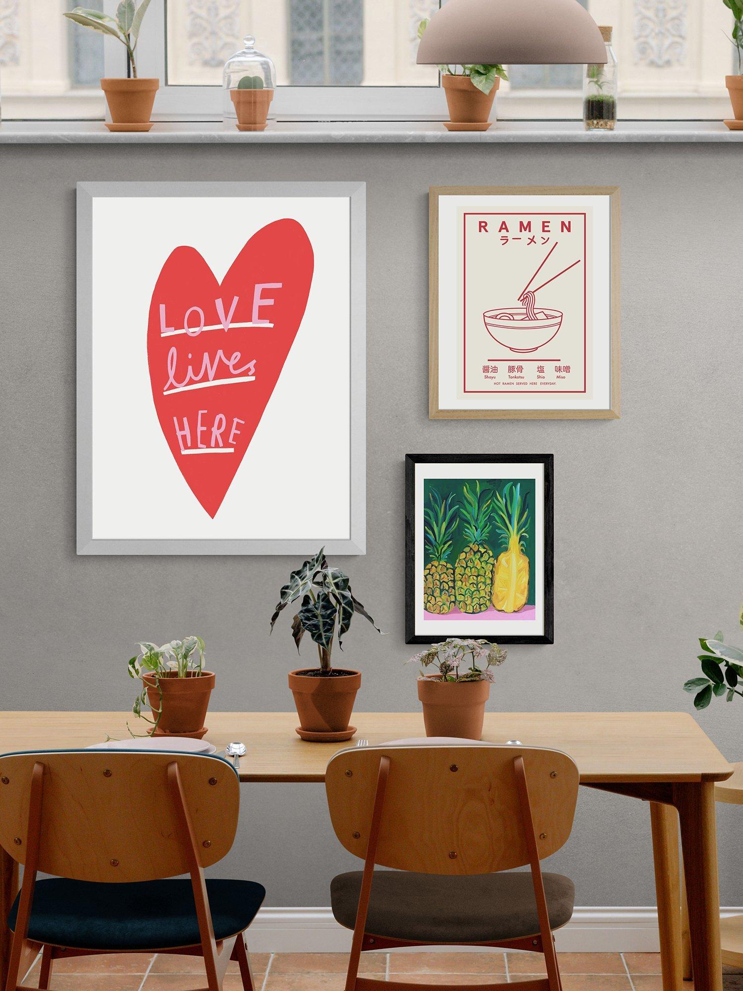 EAST END PRINTS framed print Love Lives Here 30x40cm, UK version