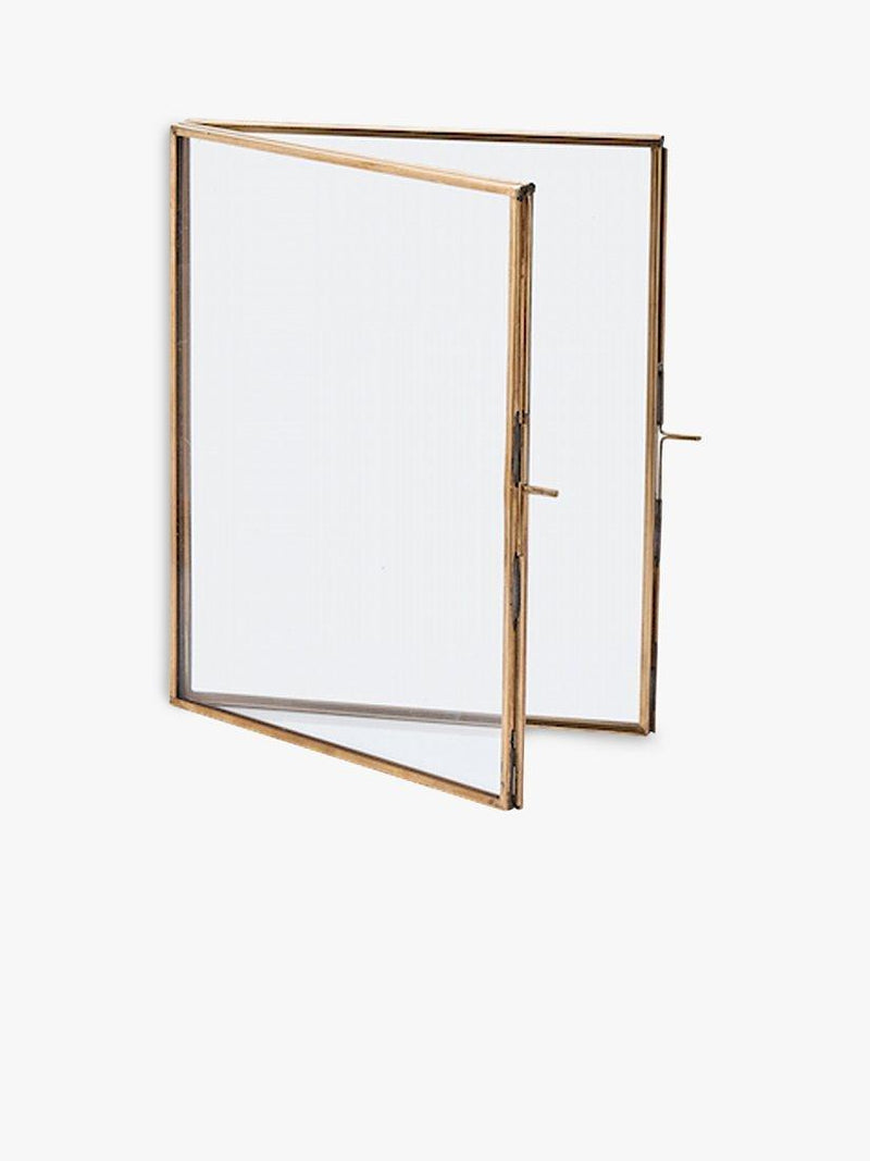 Nkuku antique brass folding photo frame for portrait display, imported from the UK