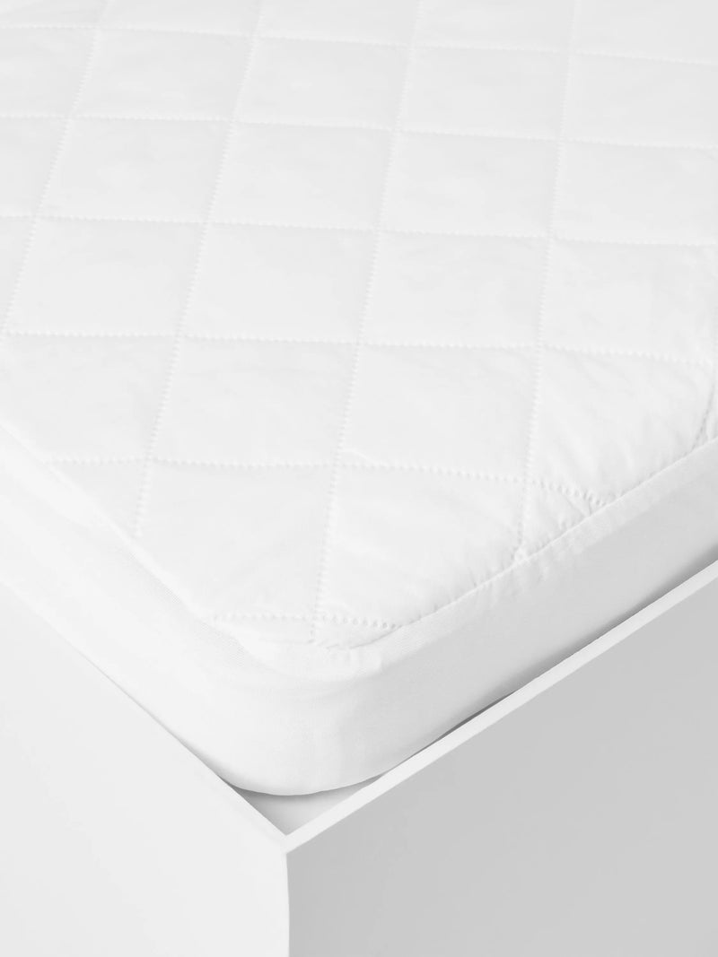 John Lewis cotbed bedding set with waterproof protectors (British brand)